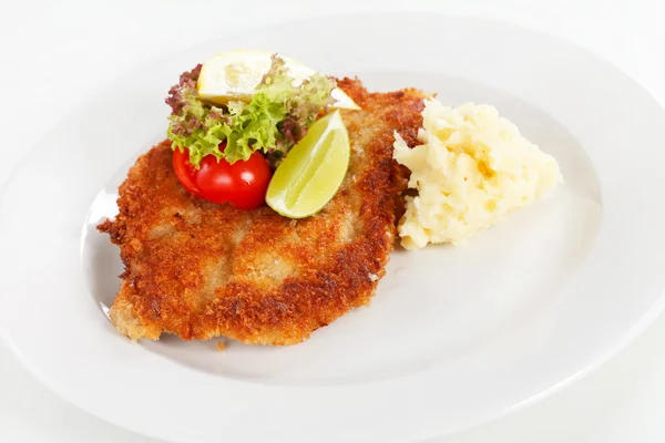 Schnitzel with potatoes — Stock Photo, Image