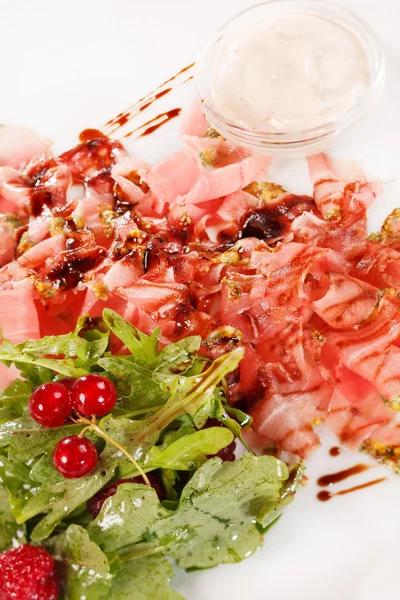 Prosciutto ham with salad — Stock Photo, Image