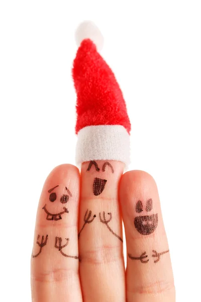 Fingers dressed in Santa-Claus red-white hats — Stock Photo, Image