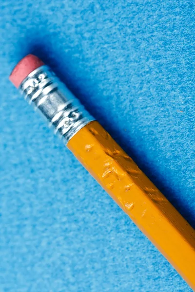 Pencil on the blue background — Stock Photo, Image