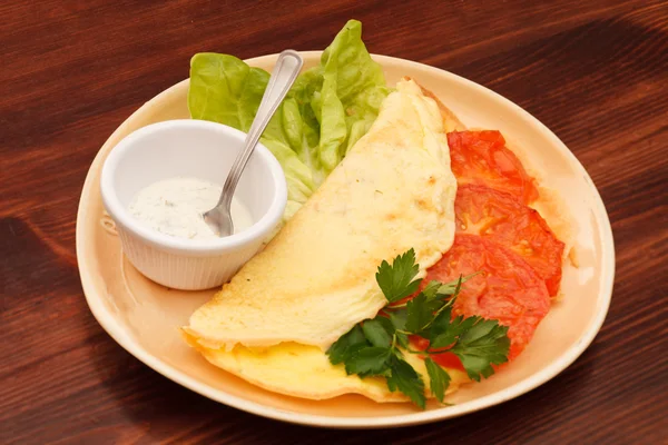 Omelet with tomatoes — Stock Photo, Image