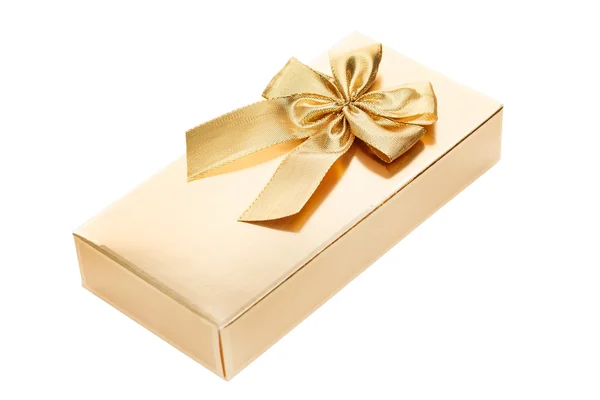 Gold gift box with gold ribbon — Stock Photo, Image