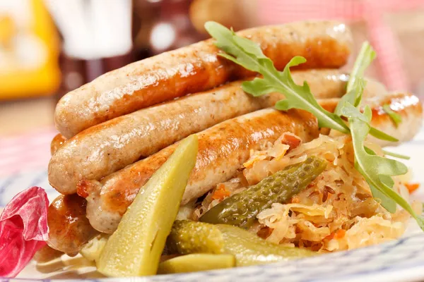 Sausages with cabbage — Stock Photo, Image