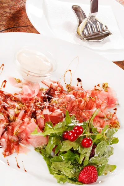 Prosciutto ham with salad — Stock Photo, Image