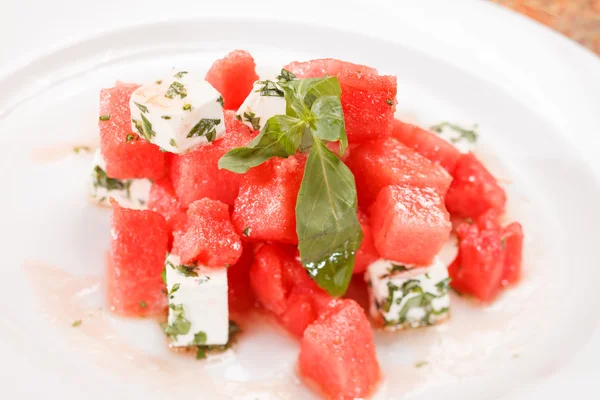 Watermelon salad with feta cheese with and basil — Stock Photo, Image