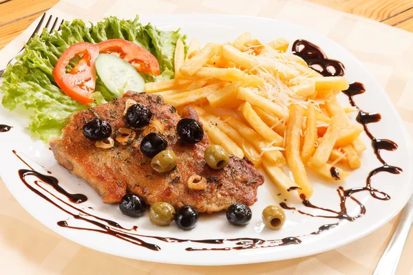 Grilled steak with french fries — Stock Photo, Image