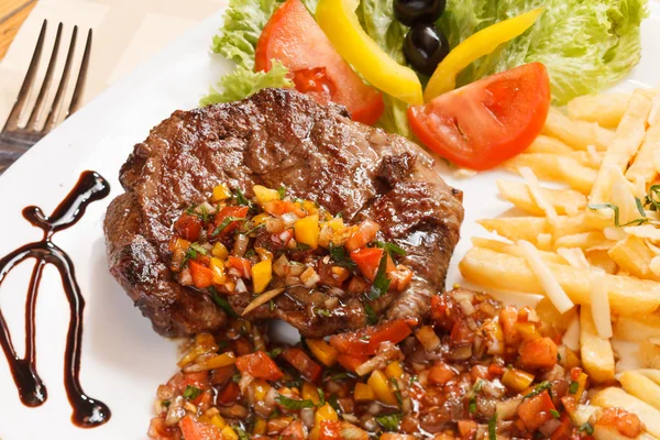 Grilled steak with french fries — Stock Photo, Image