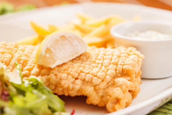 Fish with french fries potatoes — Stock Photo, Image