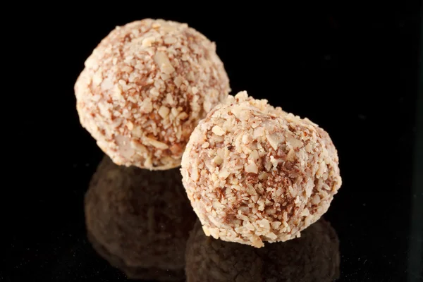 Chocolate truffle with nuts — Stock Photo, Image