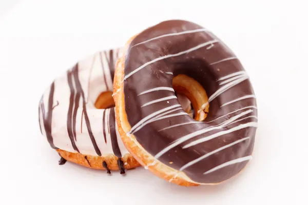 Rosquillas aisladas en blanco — Foto de Stock