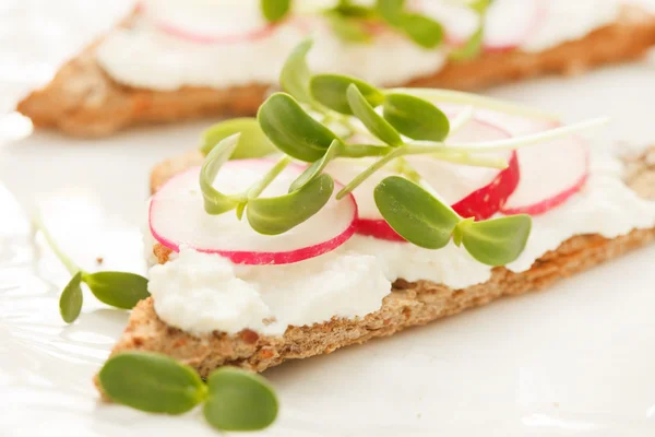 Sandwiches with radish and sunflower sprouts — Stock Photo, Image