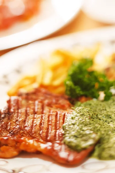 Grilled steak with french fries — Stock Photo, Image