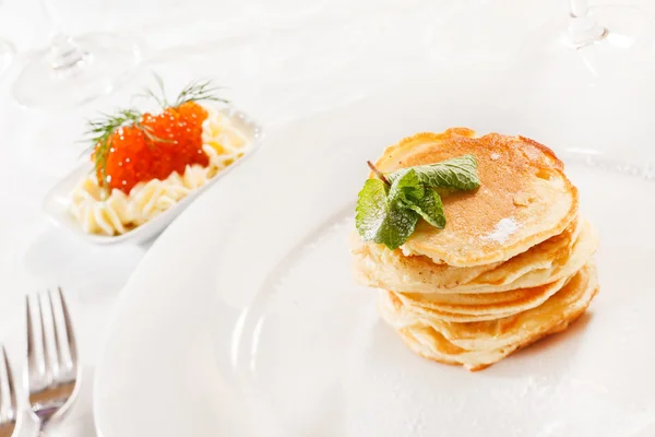 Pancakes with caviar — Stock Photo, Image