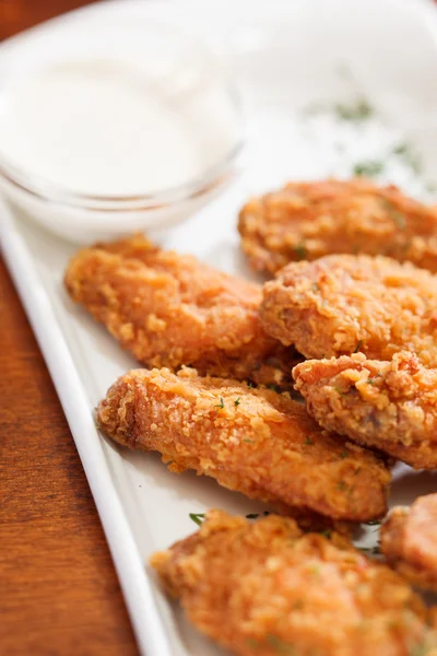 Chicken wings with sauce — Stock Photo, Image