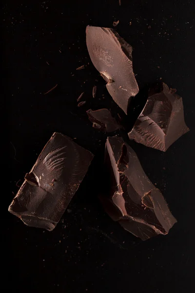 Chocolate on black background — Stock Photo, Image