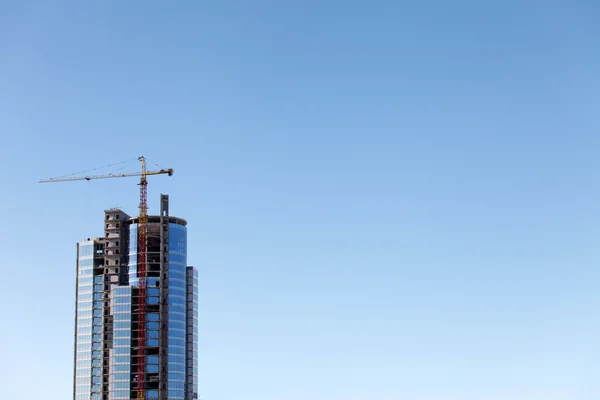 Edifício alto em construção — Fotografia de Stock