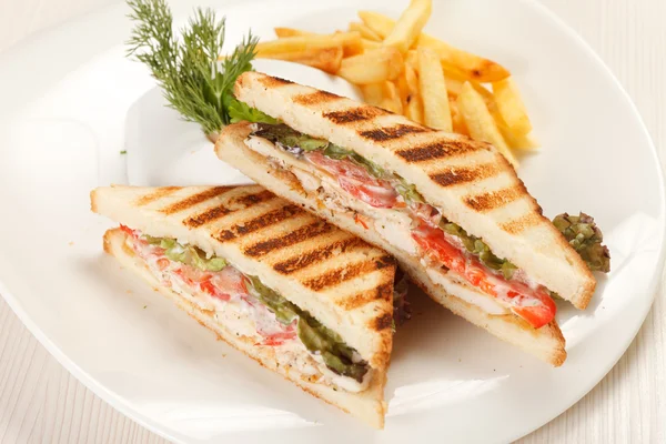 Sandwiches with French fried potatoes — Stock Photo, Image