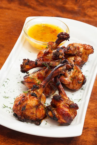 Chicken wings with sauce — Stock Photo, Image