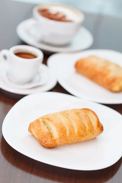 Coffee with puff pastry — Stock Photo, Image