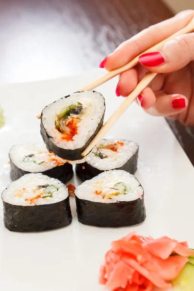 Sushi with chopsticks — Stock Photo, Image