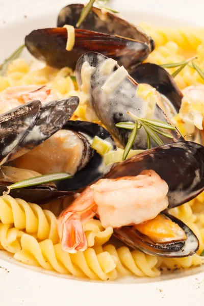 Deliciosa pasta italiana con mariscos Imagen De Stock