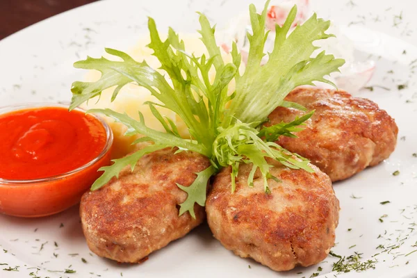 Cutlets with potatoes — Stock Photo, Image