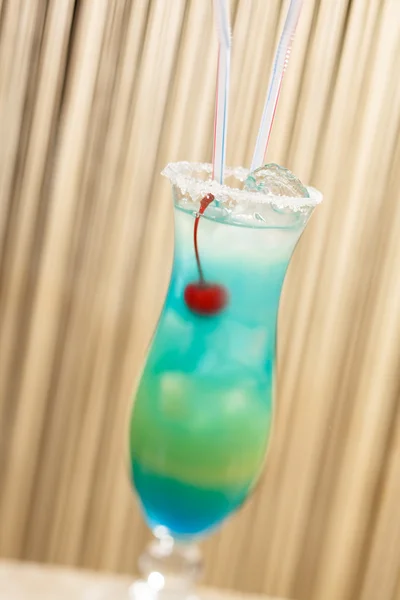 Blue cocktail with cherry — Stock Photo, Image