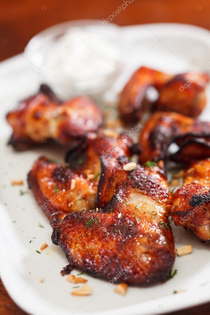 Chicken wings with sauce Stock Photo by ©Shebeko 27836987