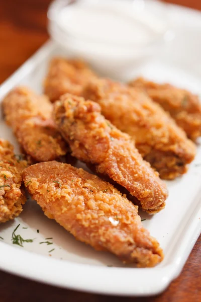Chicken wings with sauce — Stock Photo, Image