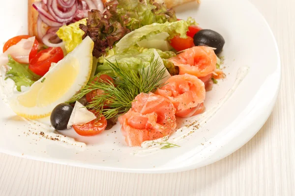 Tasty appetizer with salmon — Stock Photo, Image