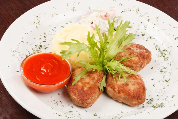 Cutlets with potatoes — Stock Photo, Image