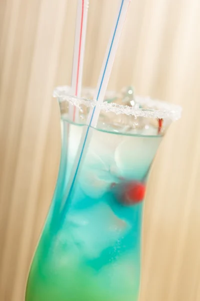 Blue cocktail with cherry — Stock Photo, Image