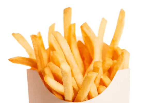 Pommes frites i en papper omslag — Stockfoto