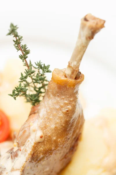 Duck leg roasted with potato — Stock Photo, Image