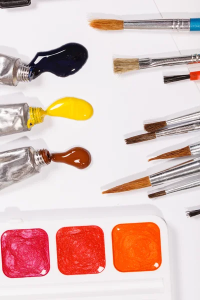 Paints with brush — Stock Photo, Image