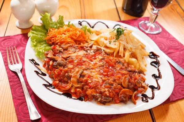 French fries with vegetables — Stock Photo, Image