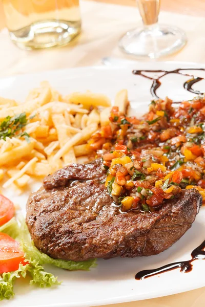 Grilled steak with french fries — Stock Photo, Image
