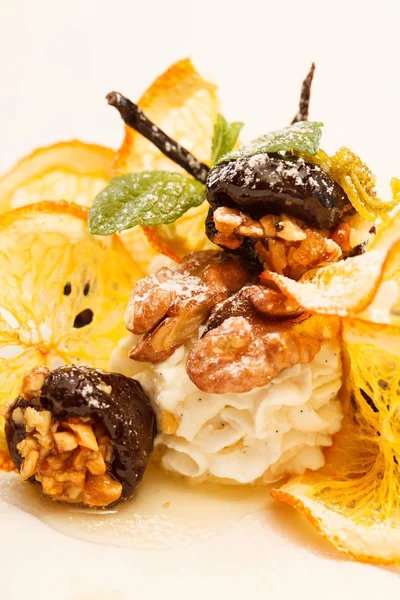 Dessert with prunes and orange — Stock Photo, Image