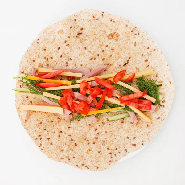 Tortilla med skinka och grönsaker — Stockfoto