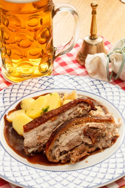 Pork with potatoes and beer — Stock Photo, Image