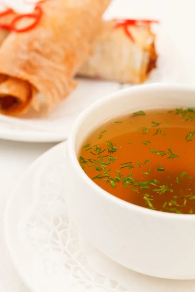 Soup with stuffed fillo rolls — Stock Photo, Image