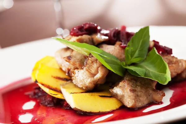 Meat with mango and cherry sauce — Stock Photo, Image