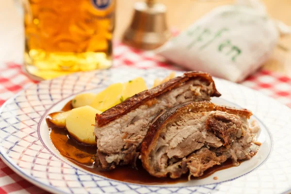 Pork with potatoes and beer — Stock Photo, Image