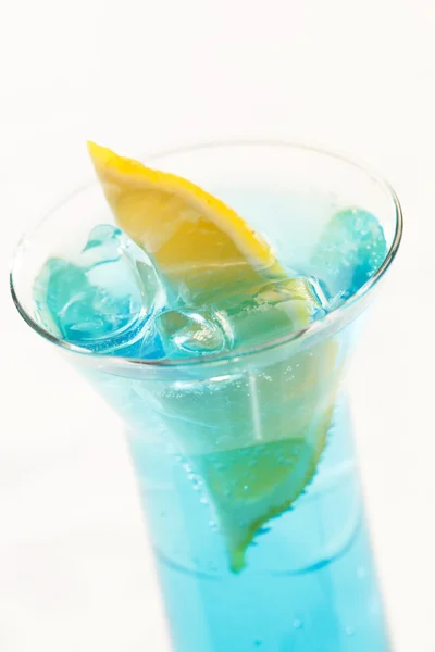 Blue cocktail with lemon — Stock Photo, Image