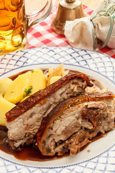 Pork with potatoes and beer — Stock Photo, Image