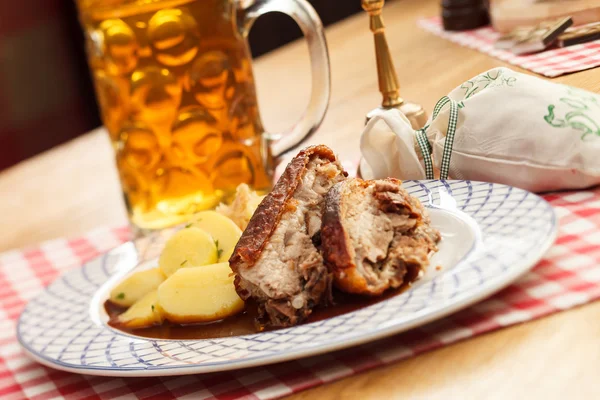 Pork with potatoes and beer — Stock Photo, Image