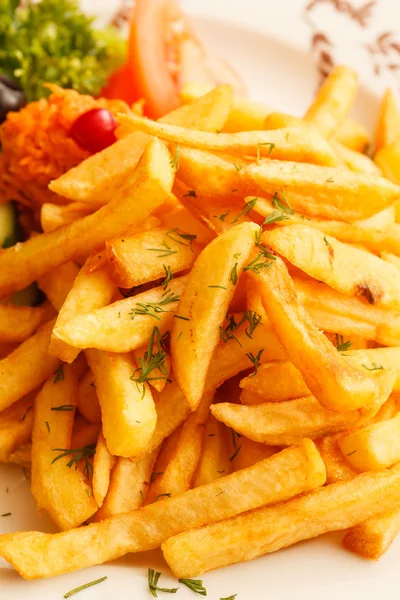 French fries with vegetables — Stock Photo, Image
