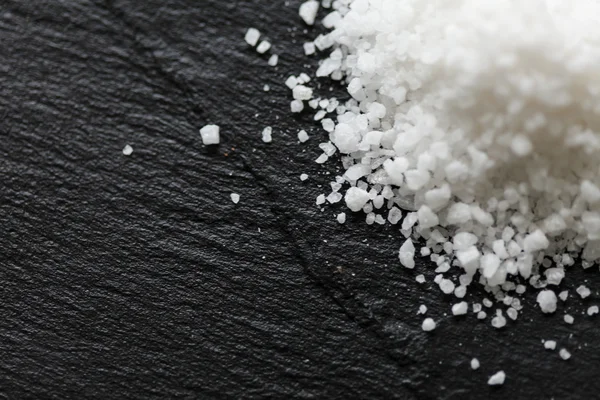 Salt on black — Stock Photo, Image