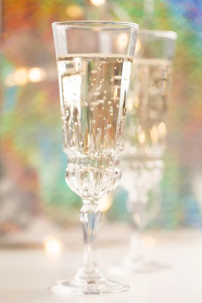 Champagne glasses on celebration table — Stock Photo, Image