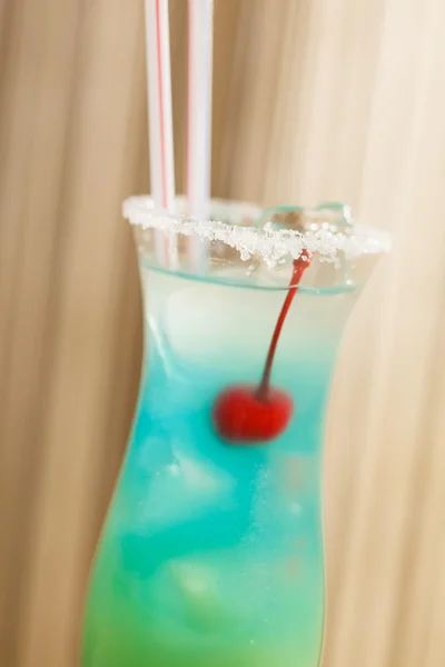 Blue cocktail with cherry — Stock Photo, Image